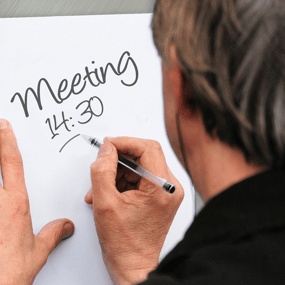 man scheduling a meeting
