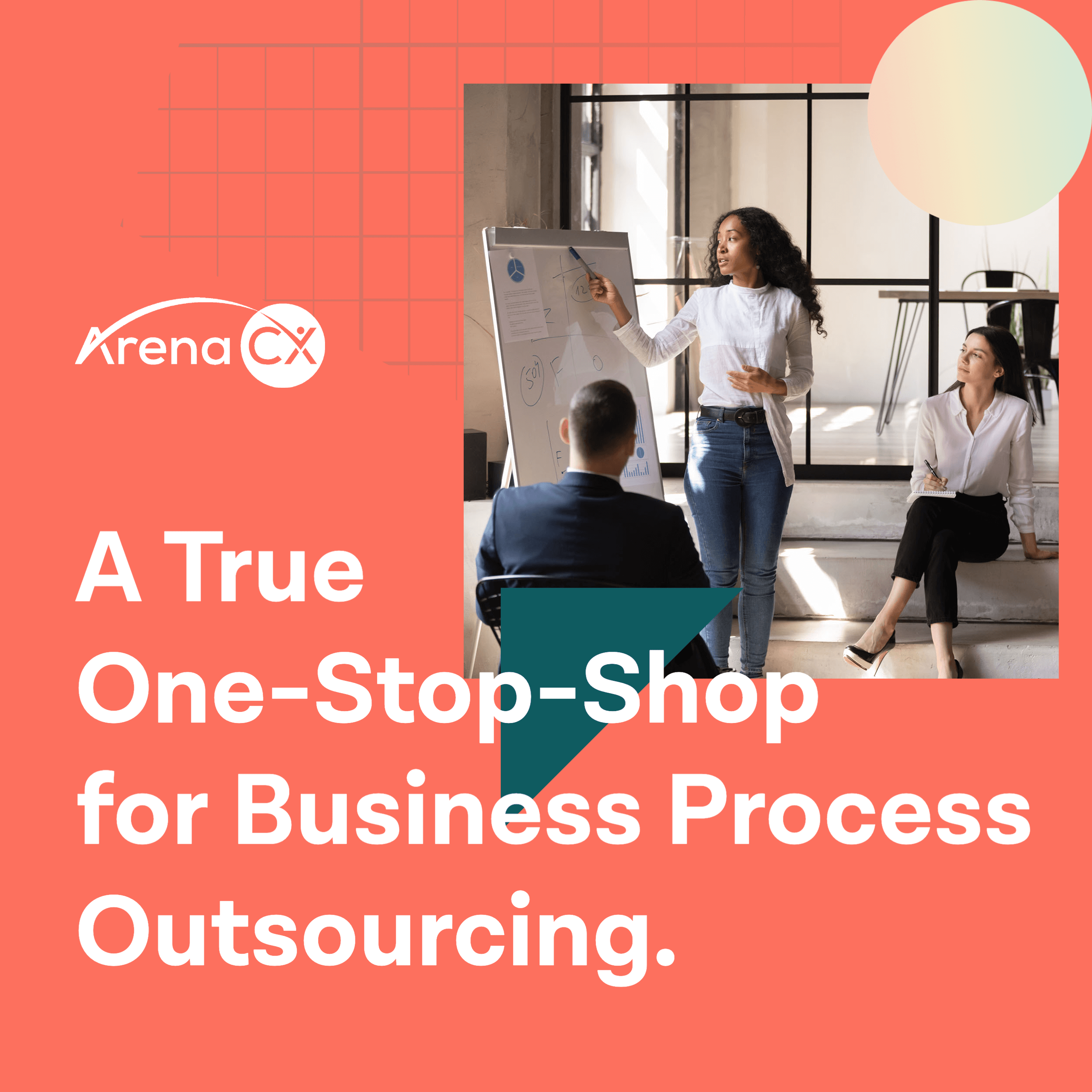 Woman in a meeting room with co-workers pointing at a whiteboard